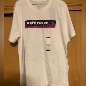 White Nike graphic tee shirt. Men’s small